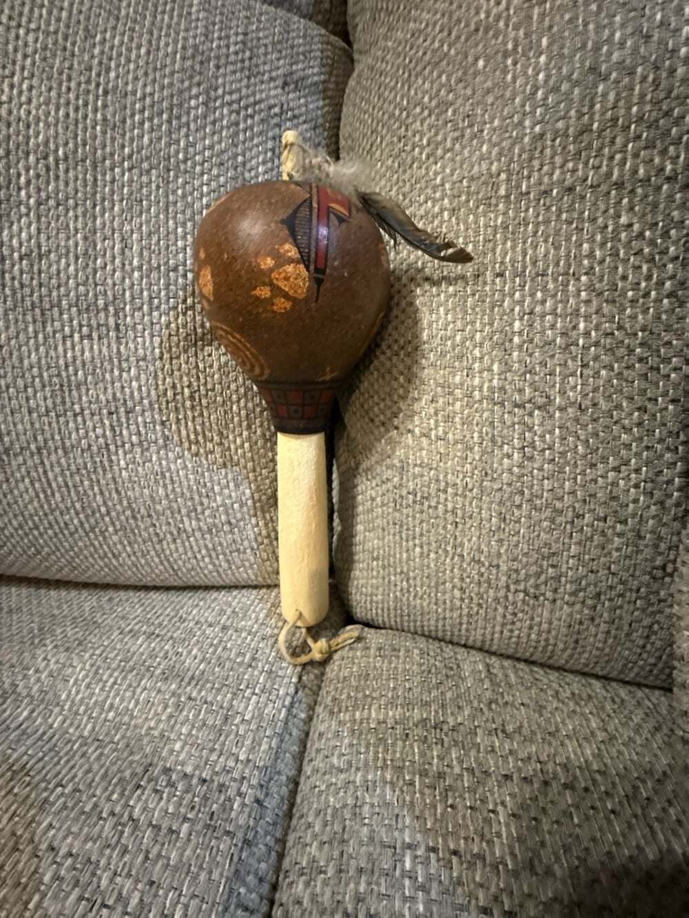 Handcrafted Native American Style Gourd Rattle with Feather